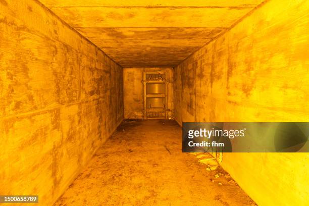 tunnel to the bunker - military bunker stock pictures, royalty-free photos & images
