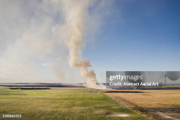 aerial image showing a permit burn in a rural location on a sunny afternoon, western australia, australia - western australia crop stockfoto's en -beelden