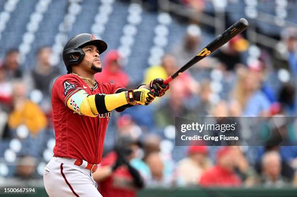 Ketel Marte of the Arizona Diamondbacks hits a three-run home run in the seventh inning against the Washington Nationals at Nationals Park on June...