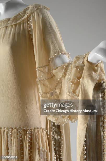 Wedding dress, 1924 . Silk crepe, lace, lame, pearls, net by Jeanne Lanvin.