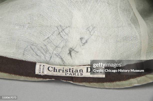 Designer label inside hat, ca 1950. By Christian Dior; worn by dancer and choreographer Ruth Page .