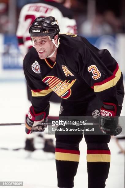 Vancouver Canucks defenseman, Doug Lidster, takes a break during a time out at the game against the NJ Devils at the Meadowlands Arena on January 12,...