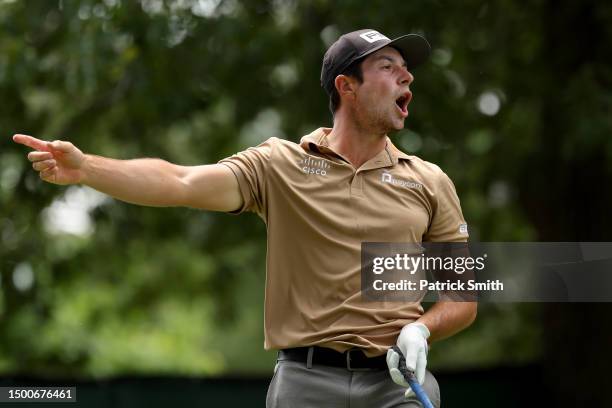 Viktor Hovland of Norway reacts to his tee shot on the fourth hole during the first round of the Travelers Championship at TPC River Highlands on...