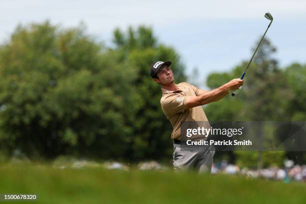 Viktor Hovland of Norway watches his shot during the first round of the Travelers Championship at TPC River Highlands on June 22, 2023 in Cromwell,...
