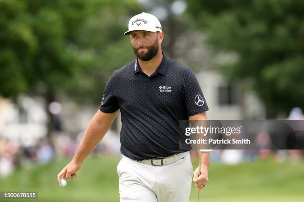 Jon Rahm of Spain walks off the second green during the first round of the Travelers Championship at TPC River Highlands on June 22, 2023 in...