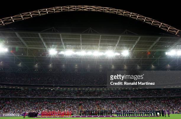 Team Canada, Team USA, and Team Japan stand on the podium with their medals after Women's Football gold medal match on Day 13 of the London 2012...