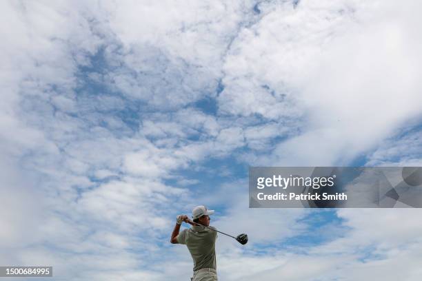 Collin Morikawa of the United States plays his shot from the third tee during the first round of the Travelers Championship at TPC River Highlands on...