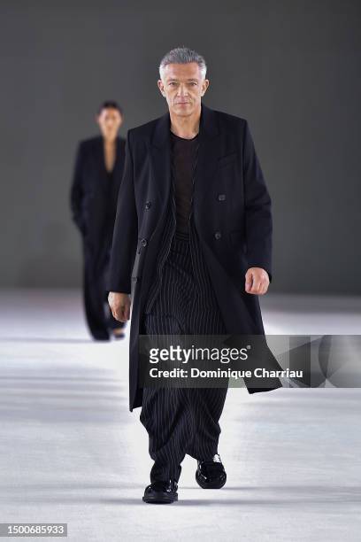 Vincent Cassel walks the runway during the Ami Alexandre Mattiussi Menswear Spring/Summer 2024 show as part of Paris Fashion Week on June 22, 2023 in...