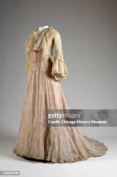 Tea gown, ca 1900 . Printed silk chiffon, silk chain stitch, and lace by Charles Frederick Worth.