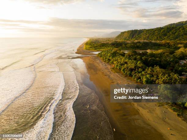 an aerial view of the pacific ocean and coastline in costa rica - costa rica aerial stock pictures, royalty-free photos & images