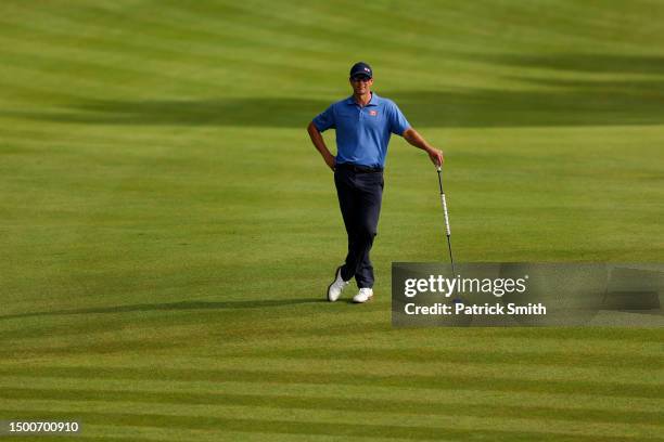 Adam Scott of Australia waits on the 15th fairway during the first round of the Travelers Championship at TPC River Highlands on June 22, 2023 in...