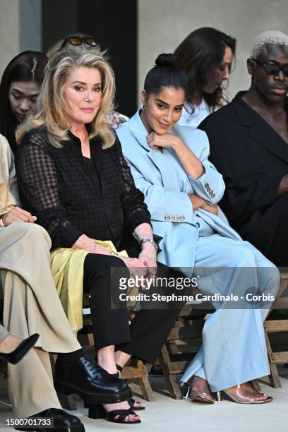 Catherine Deneuve and Leila Bekhti attend the Ami Alexandre Mattiussi Menswear Spring/Summer 2024 show as part of Paris Fashion Week on June 22, 2023...