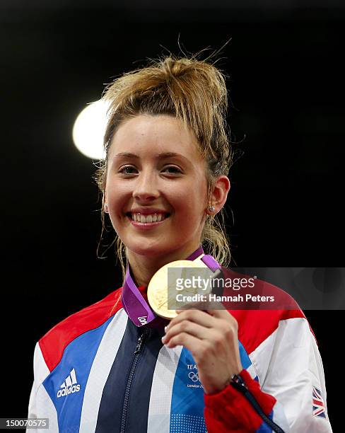 Gold medalist Jade Jones of Great Britain celebrates on the podium during the medal ceremony for the Women's -57kg Taekwondo on Day 13 of the London...