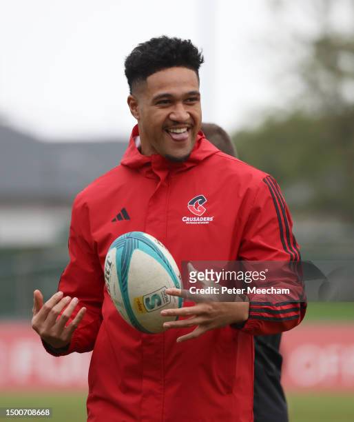 Leicester Fainga'anuku of the Crusaders has a laugh with team mates during a Crusaders Super Rugby captain's run at Rugby Park on June 23, 2023 in...
