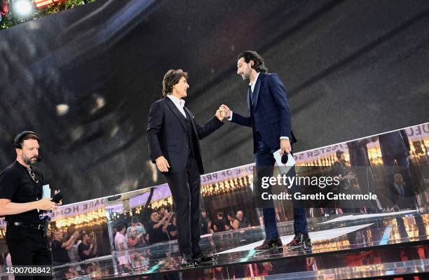 Tom Cruise and Alex Zane during the UK Premiere of "Mission: Impossible - Dead Reckoning Part One" presented by Paramount Pictures and Skydance at...