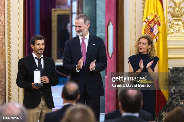 Antonio Peces-Barba, King Felipe Of Spain and Meritxell Batet attend the delivery of the 'Medallas del Congreso' by King Felipe of Spain to the...