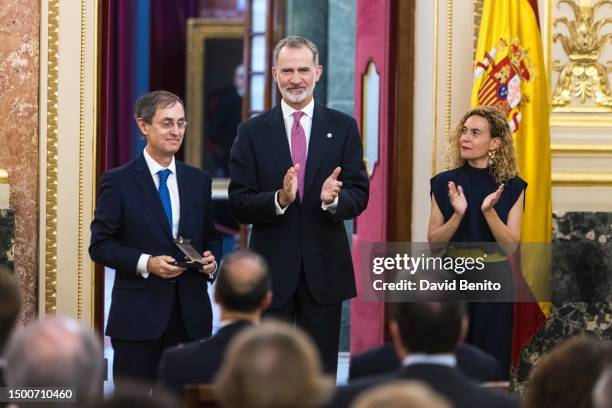 Juan José Lavilla Rubira, King Felipe Of Spain and Meritxell Batet attend the delivery of the 'Medallas del Congreso' by King Felipe of Spain to the...