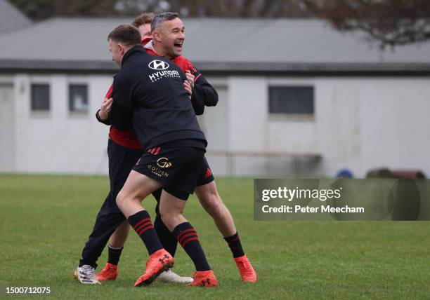 Tamati Ellison, assistant coach of the Crusaders reacts to being tackled in team building games during a Crusaders Super Rugby captain's run at Rugby...