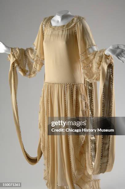 Wedding dress, 1924 . Silk crepe, lace, lame, pearls, net by Jeanne Lanvin.