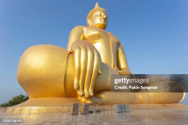 big buddha in wat muang at ang thong province popular buddhist shrine in thailand - buddha face stockfoto's en -beelden