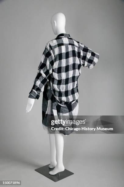 Convertible dress, ca 1992 . Checked cotton/wool/nylon blend by Comme des Garcons.