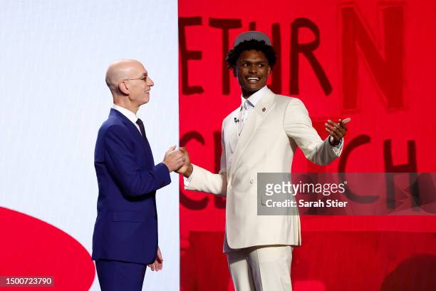Amen Thompson poses with NBA commissioner Adam Silver after being drafted fourth overall pick by the Houston Rockets during the first round of the...