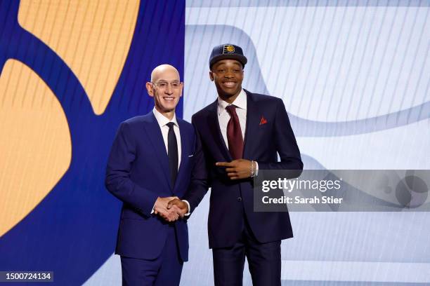 Bilal Coulibaly poses with NBA commissioner Adam Silver after being drafted seventh overall pick by the Indiana Pacers during the first round of the...