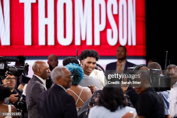 Amen Thompson celebrates after being drafted fourth overall pick by the Houston Rockets during the first round of the 2023 NBA Draft at Barclays...