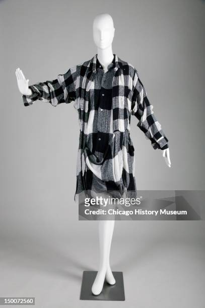 Convertible dress, ca 1992 . Checked cotton/wool/nylon blend by Comme des Garcons.