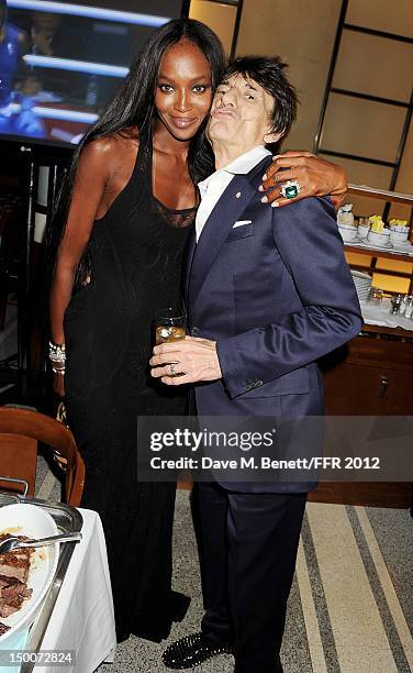 Naomi Campbell and Ronnie Wood attend as Naomi Campbell hosts an Olympic Celebration Dinner in partnership with Fashion For Relief, Interview...