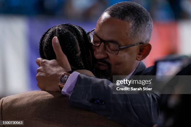 Father Juwan Howard hugs his son Jett Howard after being drafted 11th overall pick by the Orlando Magic during the first round of the 2023 NBA Draft...