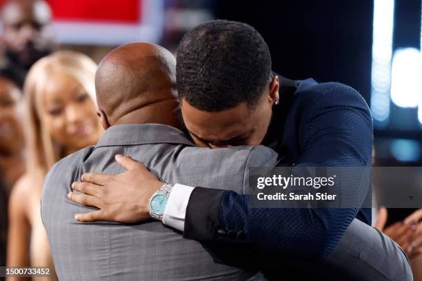 Jordan Hawkins celebrates after being drafted 14th overall pick by the New Orleans Pelicans during the first round of the 2023 NBA Draft at Barclays...