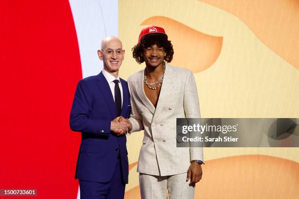 Kobe Bufkin poses with NBA commissioner Adam Silver after being drafted 15th overall pick by the Atlanta Hawks during the first round of the 2023 NBA...