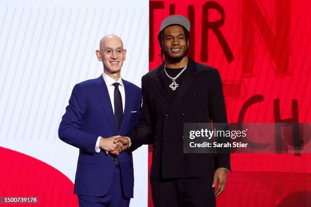 Cam Whitmore poses with NBA commissioner Adam Silver after being drafted 20th overall pick by the Houston Rockets during the first round of the 2023...