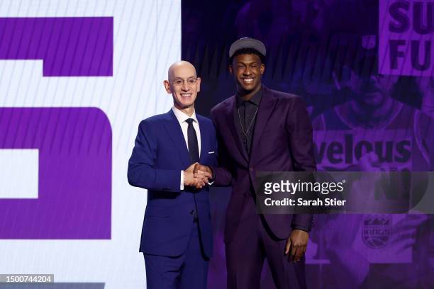 Olivier-Maxence Prosper poses with NBA commissioner Adam Silver after being drafted 24th overall pick by the Sacramento Kings during the first round...