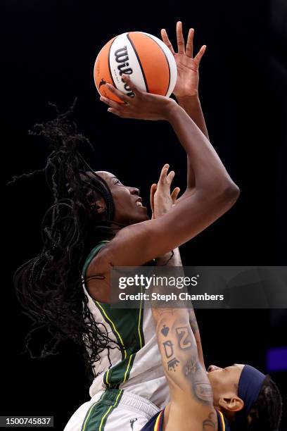 Ezi Magbegor of the Seattle Storm shoots against Emma Cannon of the Indiana Fever during the first quarter at Climate Pledge Arena on June 22, 2023...