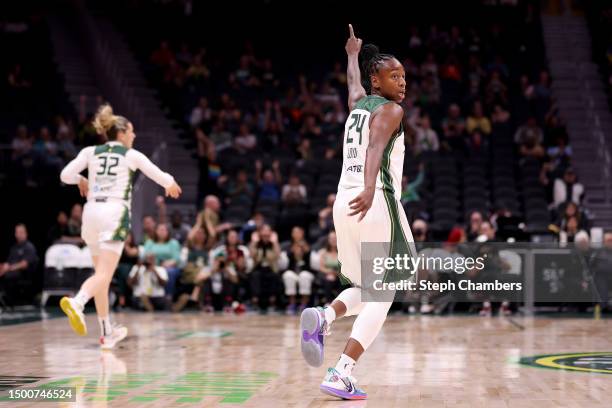 Jewell Loyd of the Seattle Storm reacts after a three point basket by Sami Whitcomb during the first quarter against the Indiana Fever at Climate...