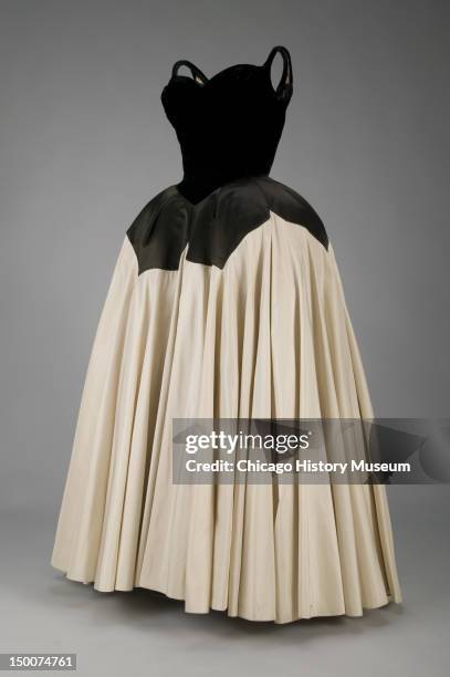 Evening dress, Petal, 1951 . Silk velvet, silk satin, silk taffeta by Charles James; worn by Mrs Harvey Byron Jr, nee Kathleen Whitcomb. Known as the...