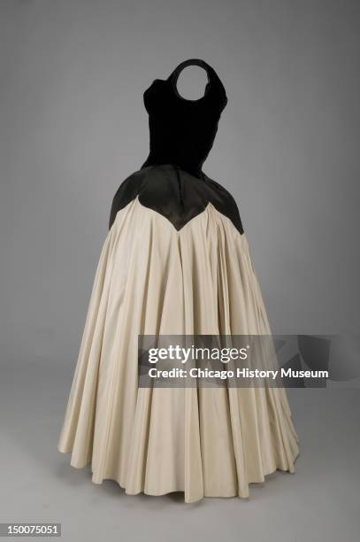Evening dress, Petal, 1951 . Silk velvet, silk satin, silk taffeta by Charles James; worn by Mrs Harvey Byron Jr, nee Kathleen Whitcomb. Known as the...