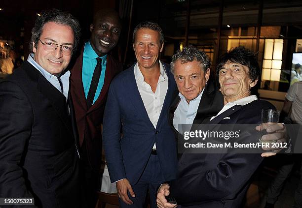 Alan Djanogly, Ozwald Boateng, Vladislav Doronin , Carlos Almada and Ronnie Wood attend as Naomi Campbell hosts an Olympic Celebration Dinner in...