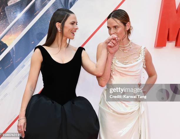 Hayley Atwell and Rebecca Ferguson attend the "Mission: Impossible - Dead Reckoning Part One" UK Premiere at Odeon Luxe Leicester Square on June 22,...