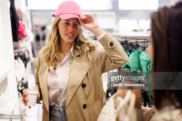 finding perfect cap - cap hat stock pictures, royalty-free photos & images