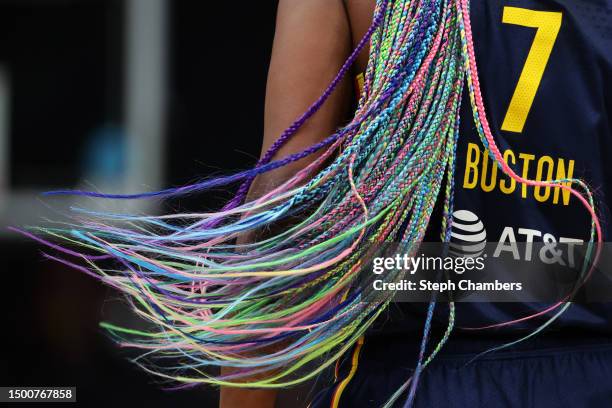 The hair braids of Aliyah Boston of the Indiana Fever are seen during the first quarter against the Seattle Storm at Climate Pledge Arena on June 22,...