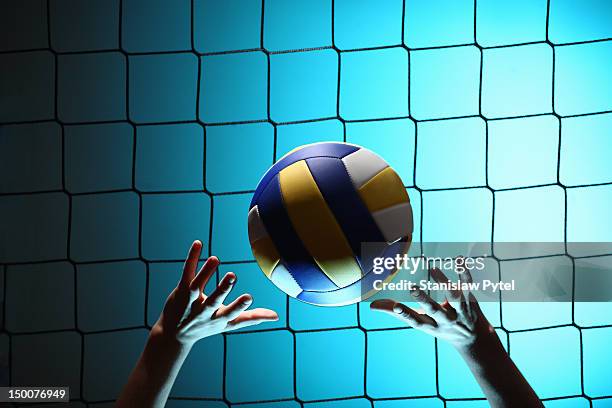 player bouncing volleyball ball - volleyball player stockfoto's en -beelden