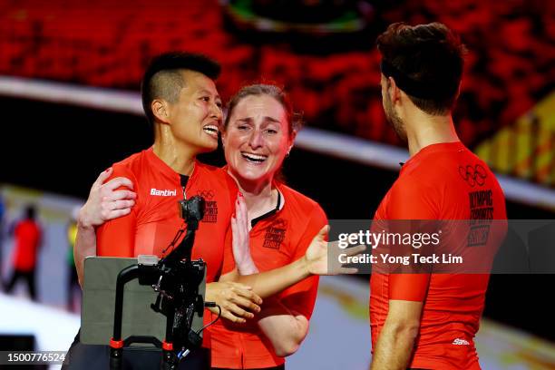 Lam Kong of Hong Kong, China, and Team Lava celebrates with teammates Alice Lethbridge of Great Britain and Lionel Vujasin of Belgium after winning...