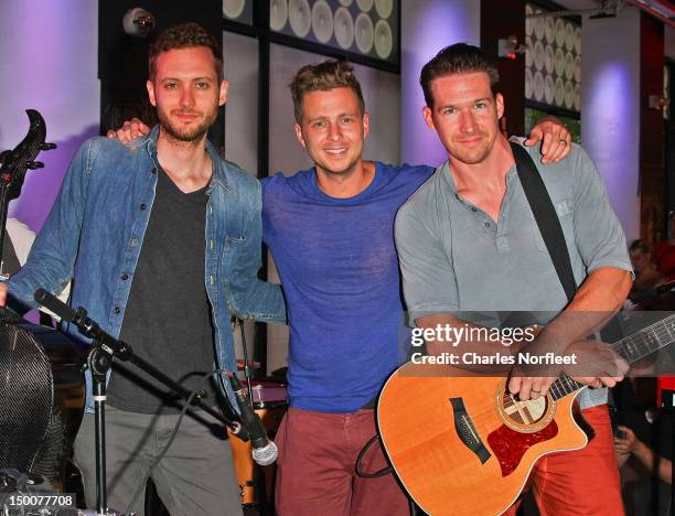 Brent Kutzle, Ryan Tedder, and Zach Filkins of OneRepublic at the MLB Fan Cave on August 9, 2012 in New York City.