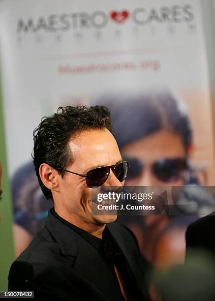 Singer Marc Anthony speaks to the media during the Maestro Cares Foundation Benefit at El Museo Del Barrio on August 9, 2012 in New York City.