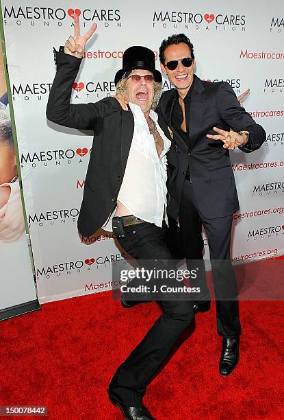 Musicians Big Kenny and Marc Anthony attend the Maestro Cares Foundation Benefit at El Museo Del Barrio on August 9, 2012 in New York City.