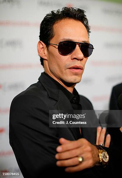 Singer Marc Anthony speaks to the media during the Maestro Cares Foundation Benefit at El Museo Del Barrio on August 9, 2012 in New York City.