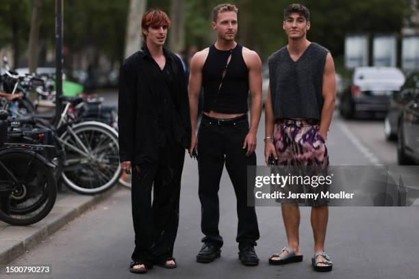 Matthias Geerst is seen wearing mesh black top and matching mesh black pants, black flanell shirt and Dior x Birkenstock sandals and Ruben van de...